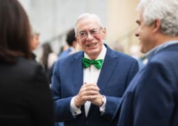 Martin Semple stands in conversation