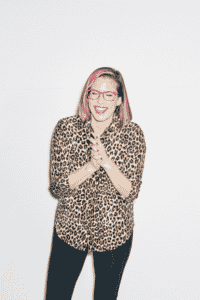 A headshot of Lauren Gunderson as she laughs