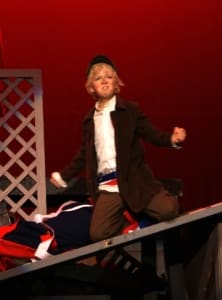 A young Erik Peterson as Gavroche in Les Mis
