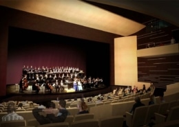 People seated in the Lone Tree Arts Center theatre while a choir performs