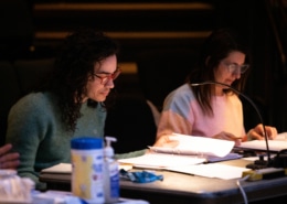 Playwright Jake Brasch and director Shelley Butler are seated at a table during rehearsal for the reservoir