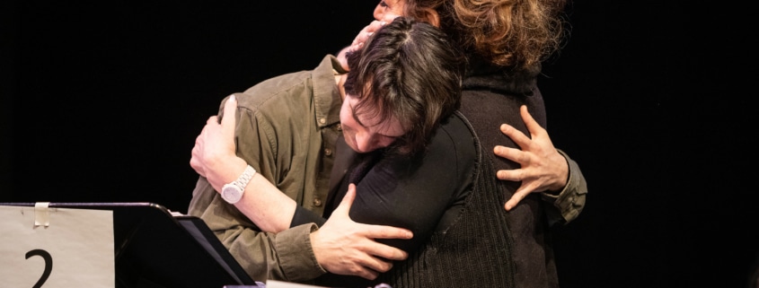 Jake Horowitz and Carline Aaron embrace during rehearsal for the reservoir