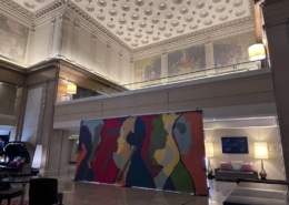 The colorful 1776 mural on display in the Renaissance Hotel lobby