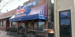 The blue and red striped awning outside The British Bulldog