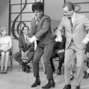 Lloyd Thaxton dances with a guest